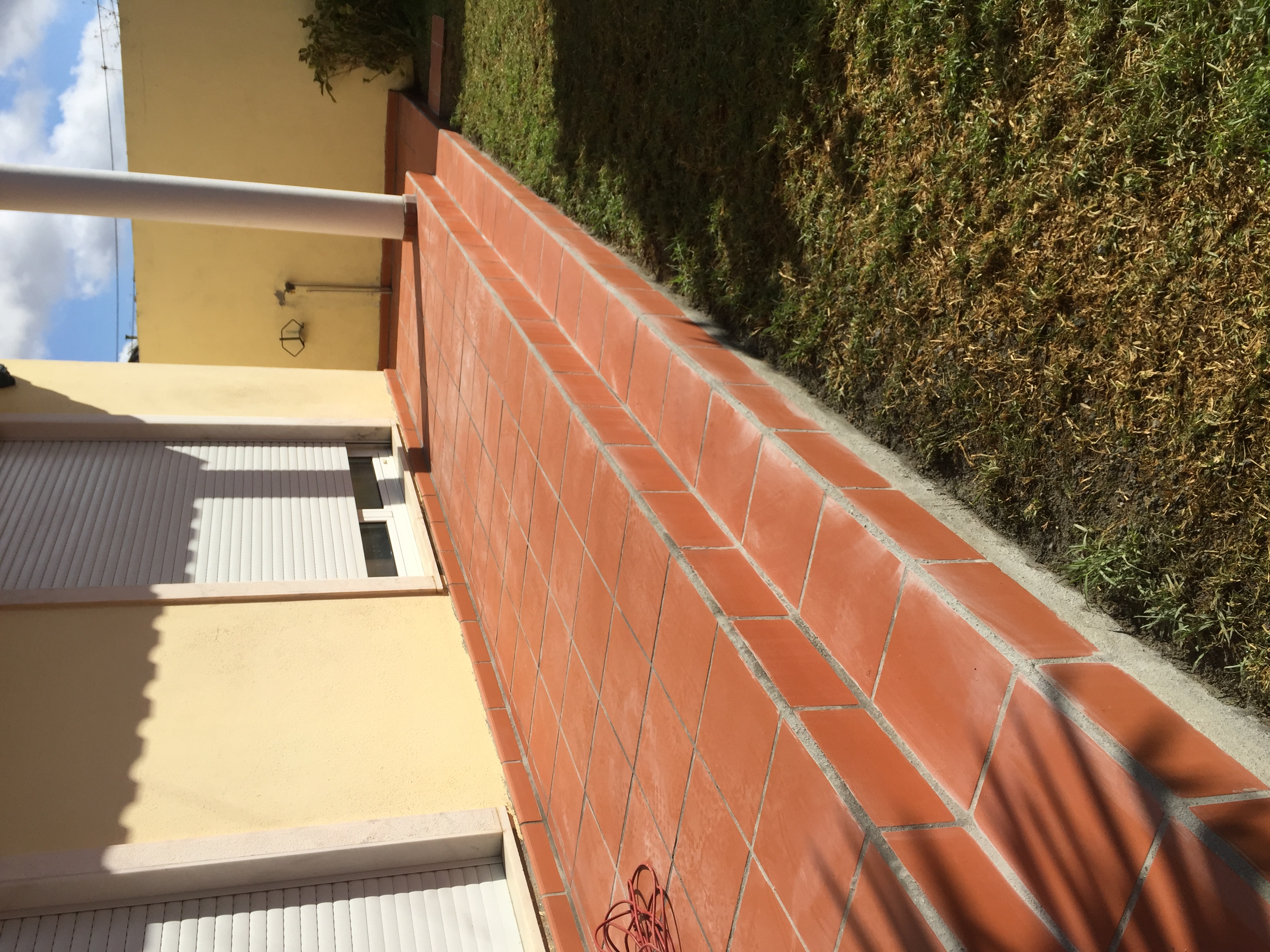 Remoçao e aplicação de tijoleira vermelha 30x30