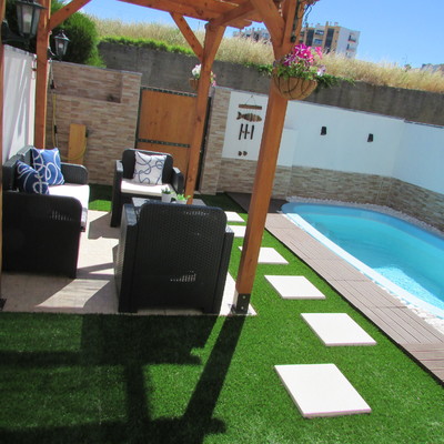 Portão de madeira, substituído por um em ferro.